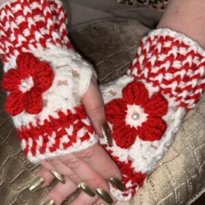 Vinger lose handschoenen rode bloem